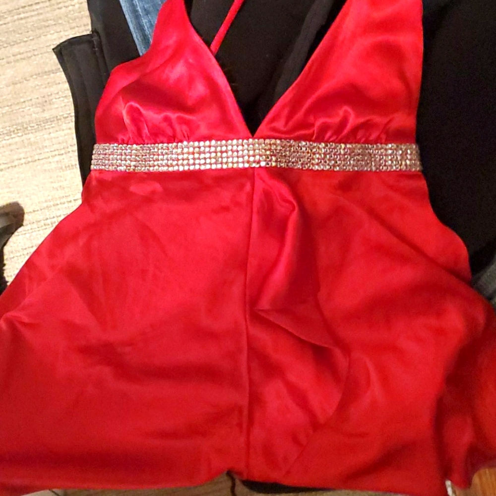 Beautiful rich red blouse with fake diamonds